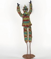 Listing image for Trudi Gilliam 1999 #276 “Jumbie Jump-Up” Copper Base Moko Jumbie Stilt Dancer